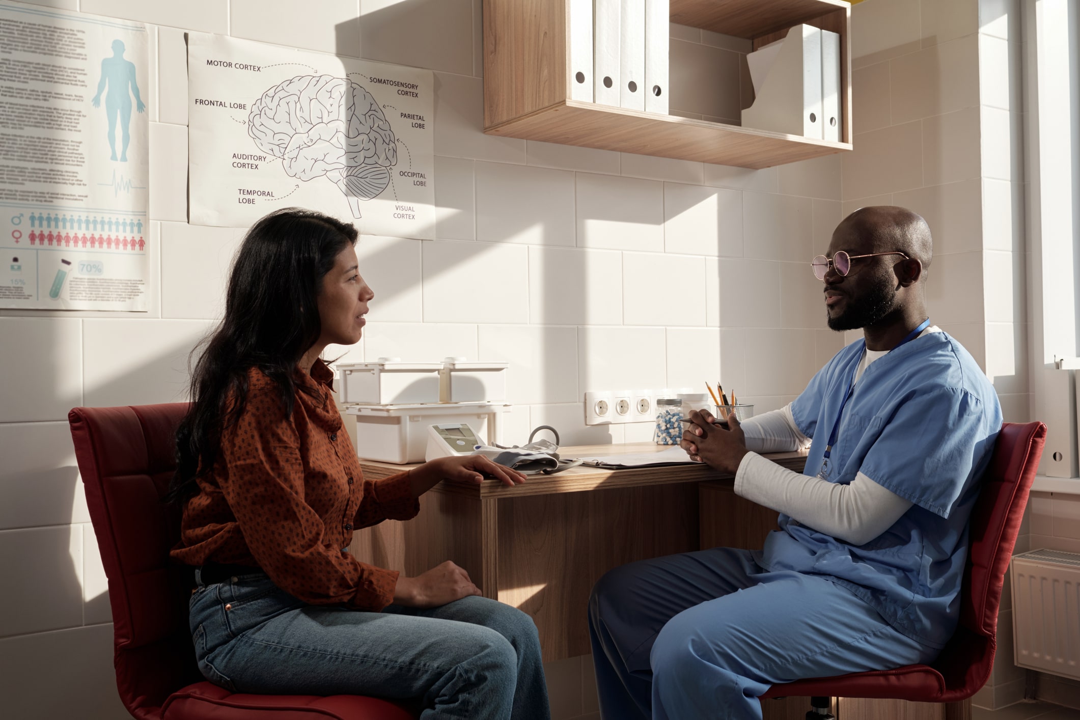 A patient talking to a medical professional